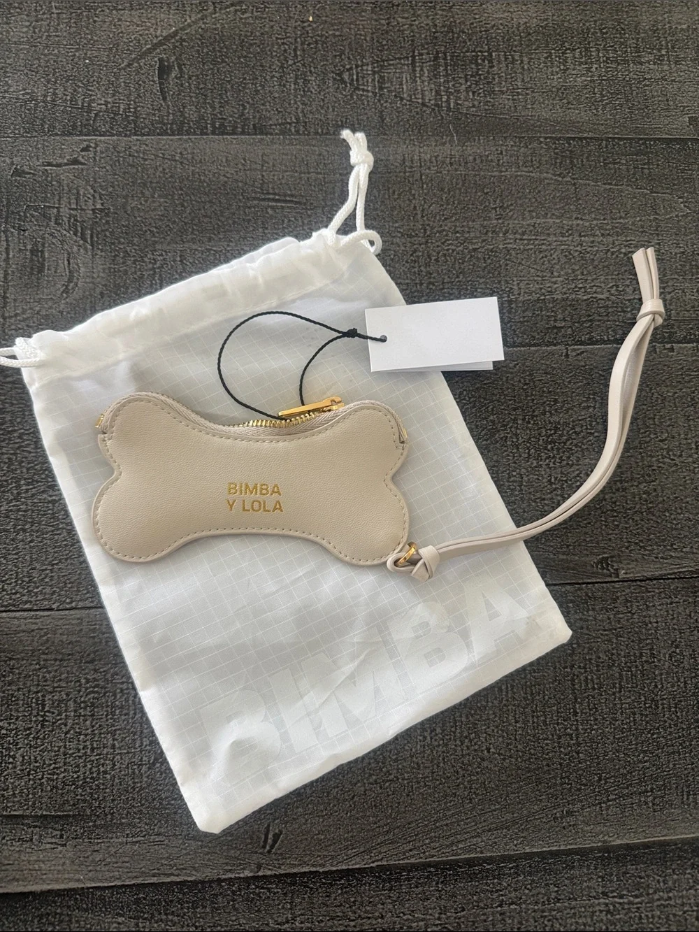 BIMBA Y LOLA Cream Bone-Shaped Dog Treat Pouch with Wrist Strap